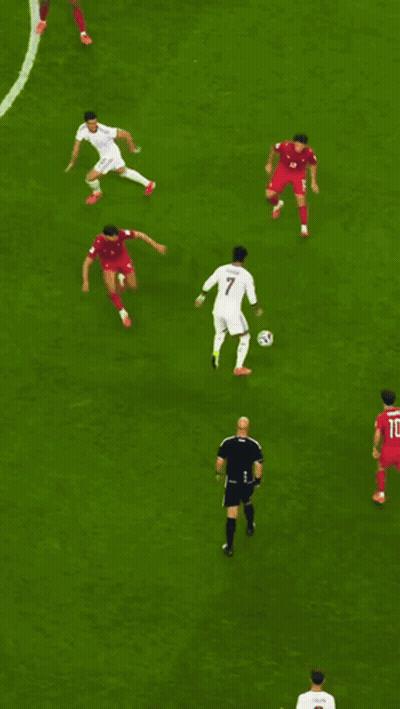 a soccer field with a visa banner behind the net