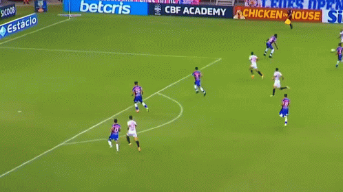 A Soccer Field With Advertisements For Betfair And Multilaser On It GIF