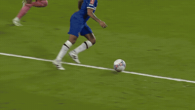 A Soccer Field With Emirates Fly Better Signs GIF
