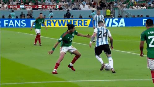 A Soccer Game Between Argentina And Mexico Is Being Played GIF