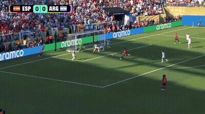 A Soccer Game Between Esp And Arg With Aramco Advertisements On The Sidelines GIF