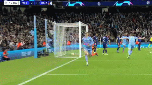 A Soccer Game Between Mci And Rma Is Being Played At 52:06 GIF