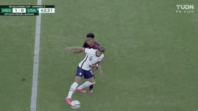 A Soccer Game Between Mexico And Usa Is Being Shown On Tv GIF