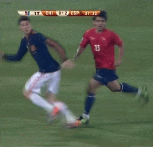 A Soccer Game Is Being Played Between Chile And Esp And The Score Is 1 To 2 GIF
