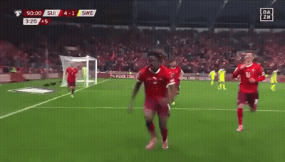 A Soccer Game Is Being Played Between Suisse And Swea GIF