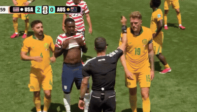A Soccer Game Is Being Played Between Usa And Aus GIF