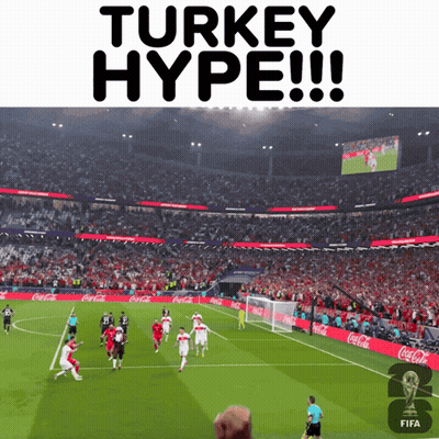 A Soccer Game Is Being Played In A Stadium Sponsored By Coca Cola GIF