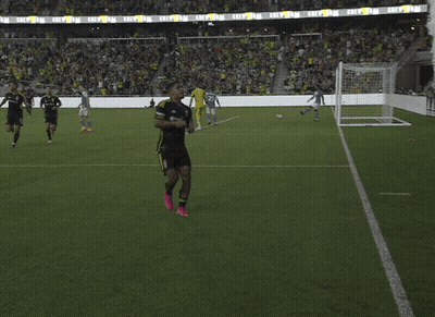 A Soccer Game Is Being Played In A Stadium That Says Crew On The Stands GIF