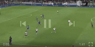 A Soccer Game Is Being Played In A Stadium With A Banner That Says Camiones GIF