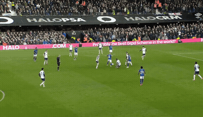 A Soccer Game Is Being Played In A Stadium With A Halo Graduates.com Banner On The Sidelines GIF