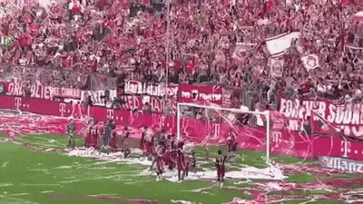 A Soccer Game Is Being Played In A Stadium With A Lot Of Fans GIF