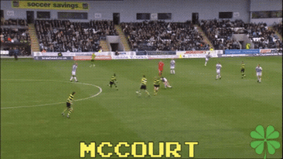 A Soccer Game Is Being Played In A Stadium With The Name Mccourt On The Screen GIF