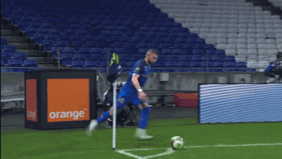 A Soccer Game Is Being Played In An Empty Stadium With Emirates Fly Better Advertisements On The Sidelines GIF