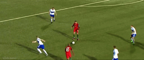 A Soccer Game Is Being Played In Front Of A Banner For Wurth And Hisense GIF