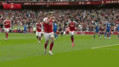 A Soccer Game Is Being Played In Front Of A Banner That Says Awfc V London City Lionesses GIF