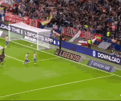 A Soccer Game Is Being Played In Front Of A Banner That Says Legends GIF
