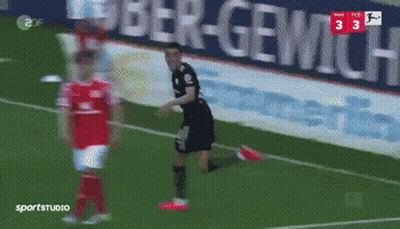 A Soccer Game Is Being Played In Front Of A Banner That Says Ober-Gemich GIF