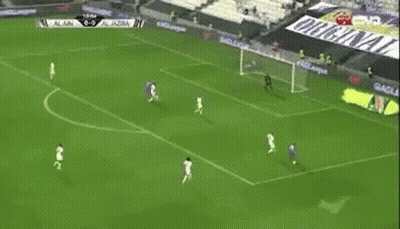A Soccer Game Is Being Played In Front Of A Banner That Says Original Pala GIF