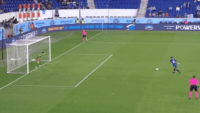 A Soccer Game Is Being Played In Front Of A Banner That Says Power GIF