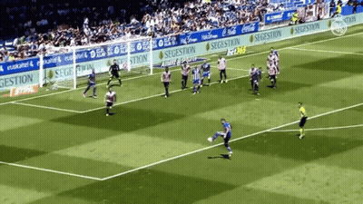 A Soccer Game Is Being Played In Front Of A Banner That Says Segestion GIF