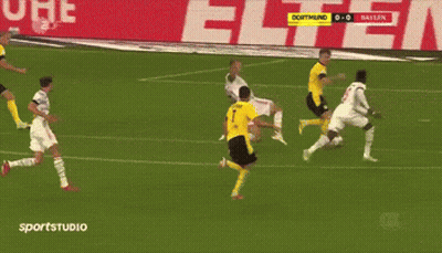 A Soccer Game Is Being Played In Front Of A Banner That Says " Sportstudio " GIF