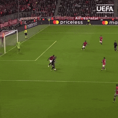 A Soccer Game Is Being Played In Front Of A Banner That Says Uefa GIF