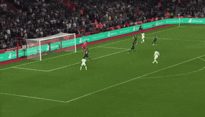 A Soccer Game Is Being Played In Front Of A Crowd With A Banner That Says Allianz On It GIF