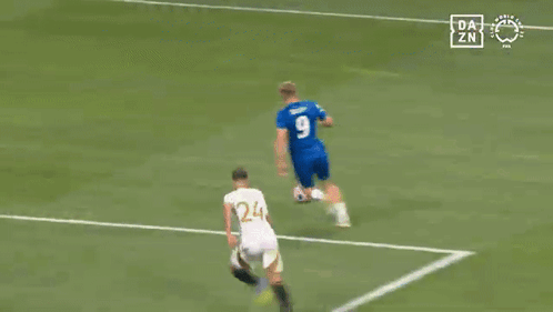 A Soccer Game Is Being Played In Front Of A Hisense Ad GIF