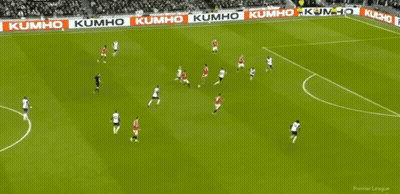 A Soccer Game Is Being Played In Front Of A Large Crowd And A Banner That Says Official Fan Token GIF