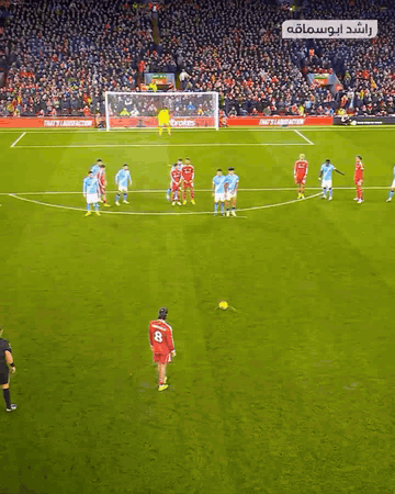 A Soccer Game Is Being Played In Front Of A Large Crowd And A Sign That Says ' Fast & Furious ' GIF