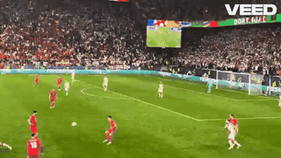 A Soccer Game Is Being Played In Front Of A Large Crowd And The Word Veed Is On The Screen GIF