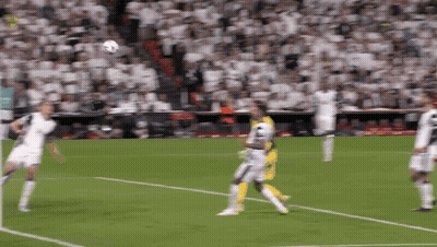 A Soccer Game Is Being Played In Front Of A Large Crowd GIF