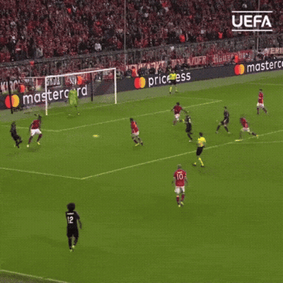 A Soccer Game Is Being Played In Front Of A Mastercard Ad GIF