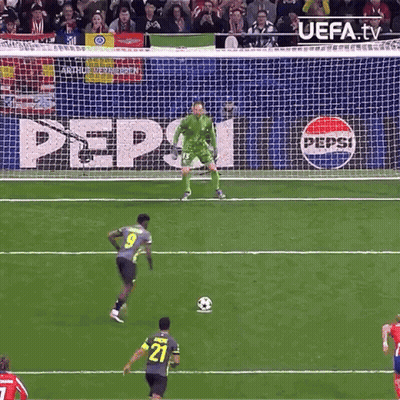 A Soccer Game Is Being Played In Front Of A Pepsi Advertisement GIF