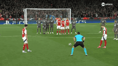 A Soccer Game Is Being Played In Front Of A Playstation Sign GIF