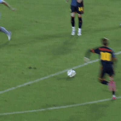 A Soccer Game Is Being Played In Front Of A Sign For Adidas GIF