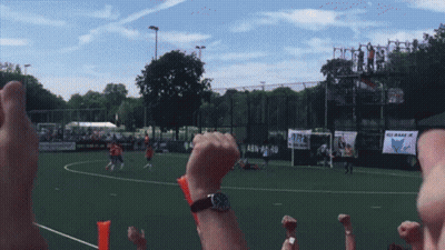 A Soccer Game Is Being Played In Front Of A Sign That Says Abn 24-10 GIF