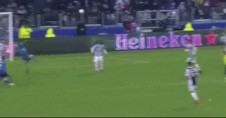 A Soccer Game Is Being Played In Front Of A Sign That Says Carica GIF