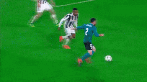 A Soccer Game Is Being Played In Front Of A Sign That Says Carica Mobile GIF
