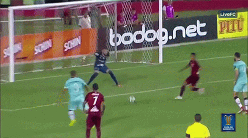 A Soccer Game Is Being Played In Front Of A Sign That Says Schin GIF
