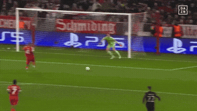 A Soccer Game Is Being Played In Front Of A Sign That Says Schmidting GIF