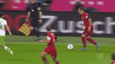 A Soccer Game Is Being Played In Front Of A Sign That Says Zusch GIF