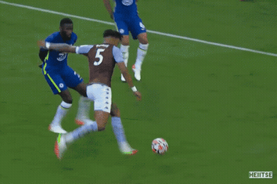 A Soccer Game Is Being Played In Front Of A Yokohama Ad GIF