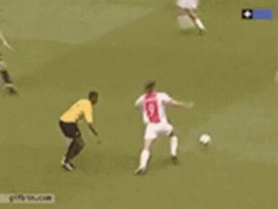 A Soccer Game Is Being Played In Front Of An Ad For Energie GIF