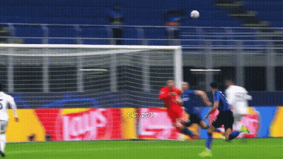 A Soccer Game Is Being Played In Front Of An Ad For Lays Chips GIF