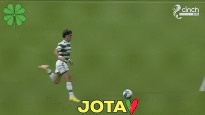 A Soccer Game Is Being Played In Front Of An Advertisement For Magners Beer GIF