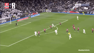A Soccer Game Is Being Played In Front Of An Emirates Fly Better Banner GIF