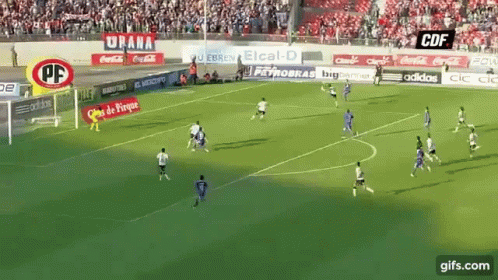 A Soccer Game Is Being Played On A Field Sponsored By Coca Cola GIF