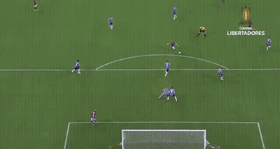 A Soccer Game Is Being Played On A Field That Says Libertadores On It GIF