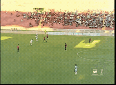 A Soccer Game Is Being Played On A Field With A M Logo On The Corner GIF